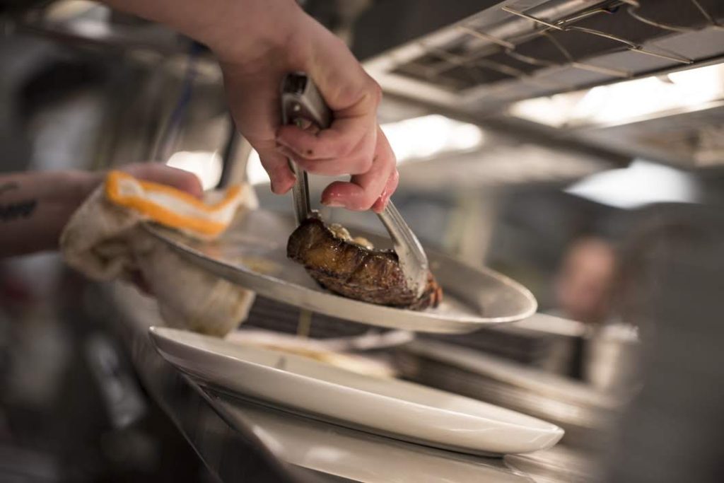 serving steak in kitchen Restaurant Job opportunities